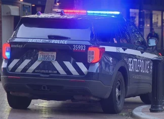 Man posing as mail carrier attacks Phinney Ridge couple, demands cryptocurrency