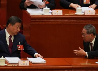 China sets a lower economic growth target of 4.5% to 5% for 2026 as challenges loom : NPR