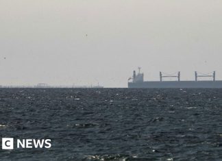 Strait of Hormuz closed again, Iran says, as ships attacked – BBC