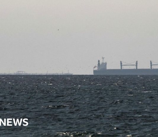 Strait of Hormuz closed again, Iran says, as ships attacked – BBC