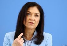 German economy growth forecasts halved