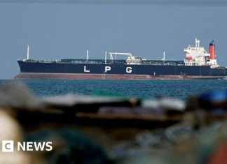 UK says Iran holding world economy 'hostage' with Hormuz attacks – BBC