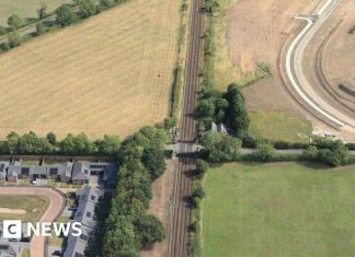 New road to allow closure of level crossing – BBC