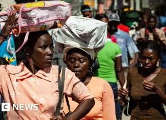Supreme Court allows Trump to end protected status for Haitian and Syrian migrants
