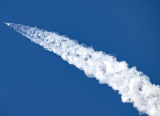 SpaceX stock gains 19% on first day of trading : NPR