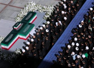 Khamenei’s other sons appear at his funeral in Iran as new supreme leader remains in hiding