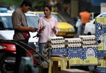 Iran faces region’s harshest mix of wartime contraction and inflation