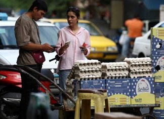 Iran faces region’s harshest mix of wartime contraction and inflation