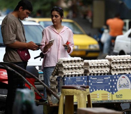 Iran faces region’s harshest mix of wartime contraction and inflation