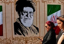 Iran vows ‘devastating’ response as U.S. threatens toughest ever economic hit
