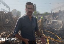 BBC visits smouldering Kyiv market after Russian strikes