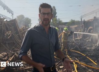 BBC visits smouldering Kyiv market after Russian strikes