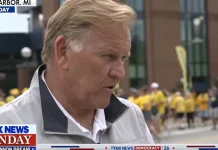 Football and politics merge at Michigan tailgate as Senate candidates mingle with attendees