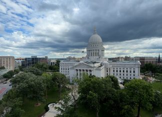 Evers casts doubt on compromise for growing budget surplus