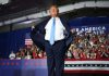 Photos of Trump’s cheap suit have gone viral. Here’s why