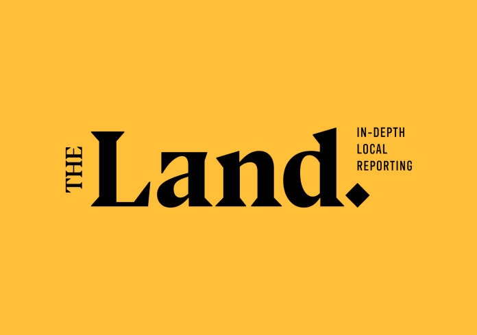 theLand_yellow_tag.png